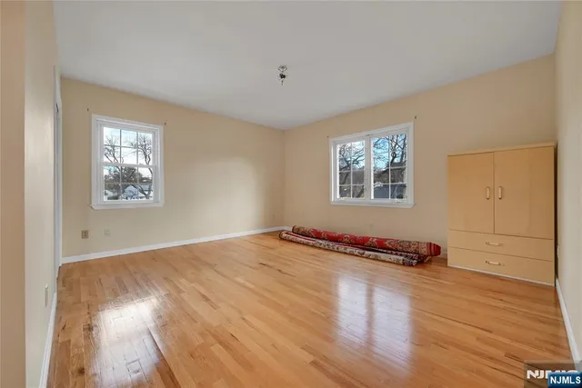 a view of a livingroom with wooden floor