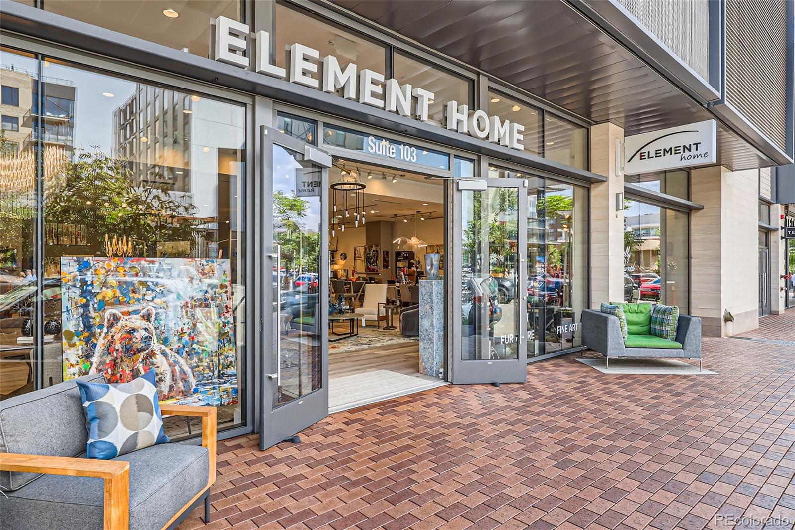 357 Harrison Street Denver, CO 80206 - Photo 30 of 40 a outdoor living area with a glass door and furniture