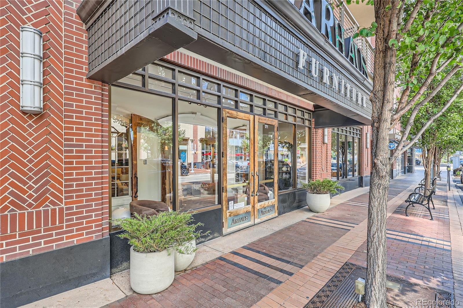 357 Harrison Street Denver, CO 80206 - Photo 32 of 40 a view of a building with sitting area