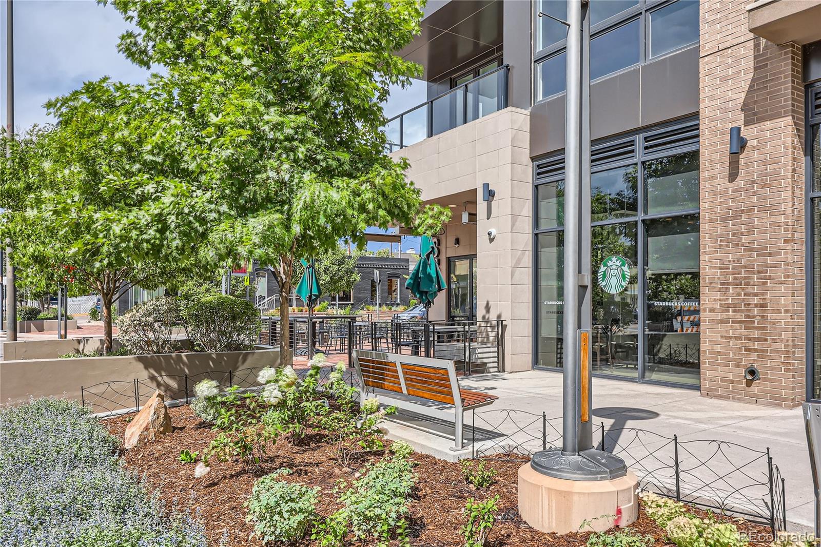 357 Harrison Street Denver, CO 80206 - Photo 34 of 40 a house view with a sitting space and garden space