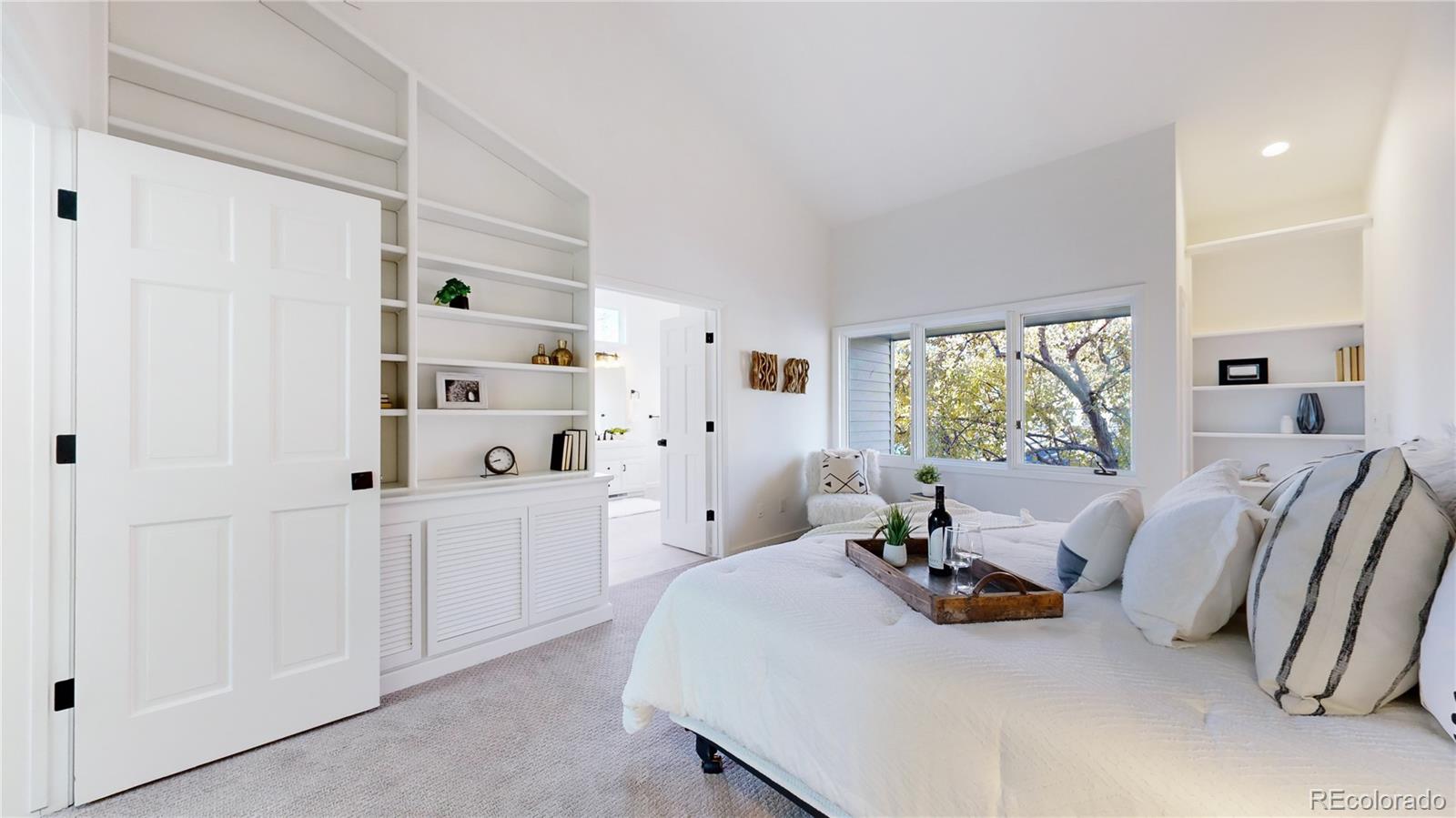 357 Harrison Street Denver, CO 80206 - Photo 10 of 40 a living room with furniture a window and gym equipment