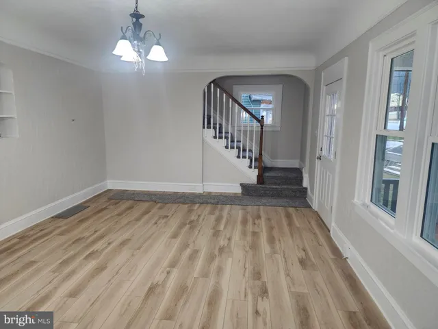 a bathroom with a toilet sink and vanity