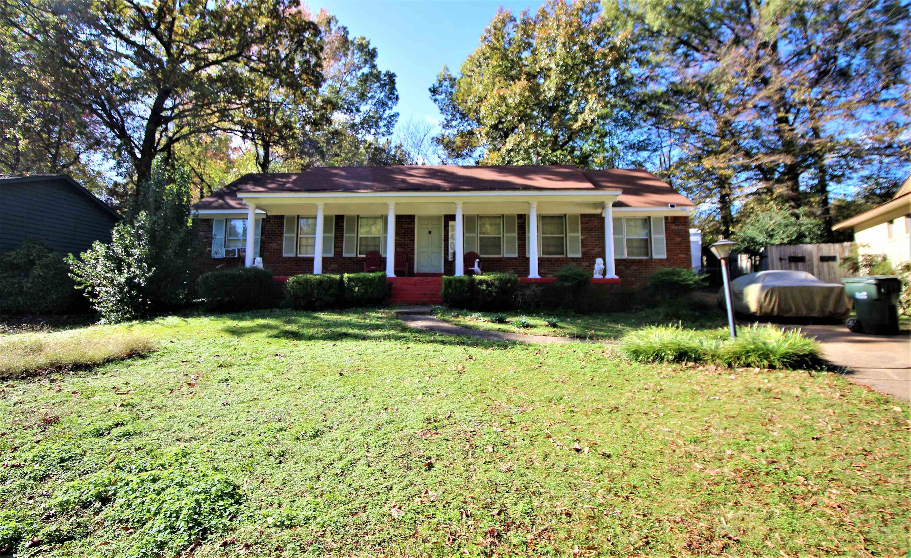 3409 Adrick Road Memphis, TN 38128 - Photo 1 of 14 a front view of a house with a garden