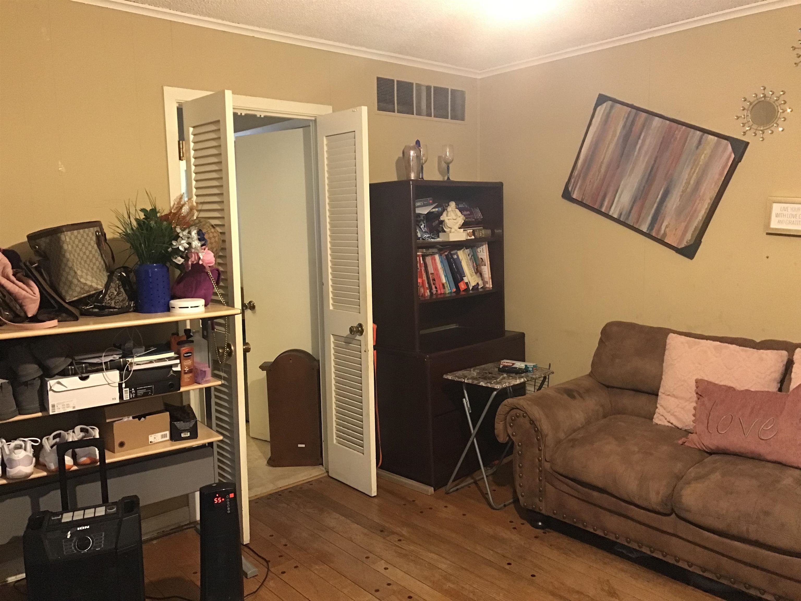 3409 Adrick Road Memphis, TN 38128 - Photo 11 of 14 a living room with furniture and a window