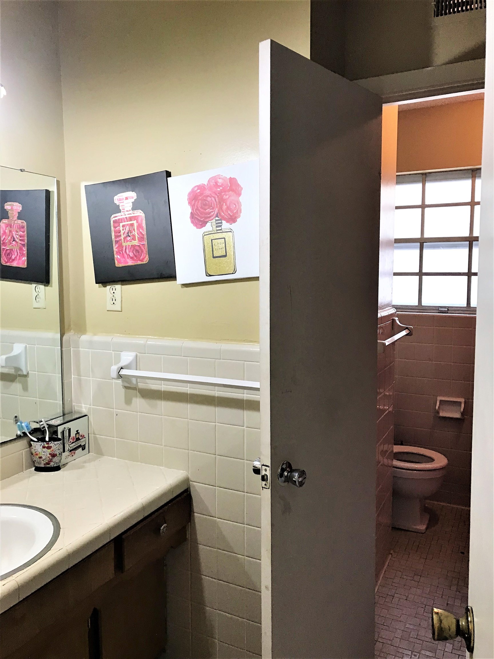 3409 Adrick Road Memphis, TN 38128 - Photo 12 of 14 a bathroom with a sink and a mirror