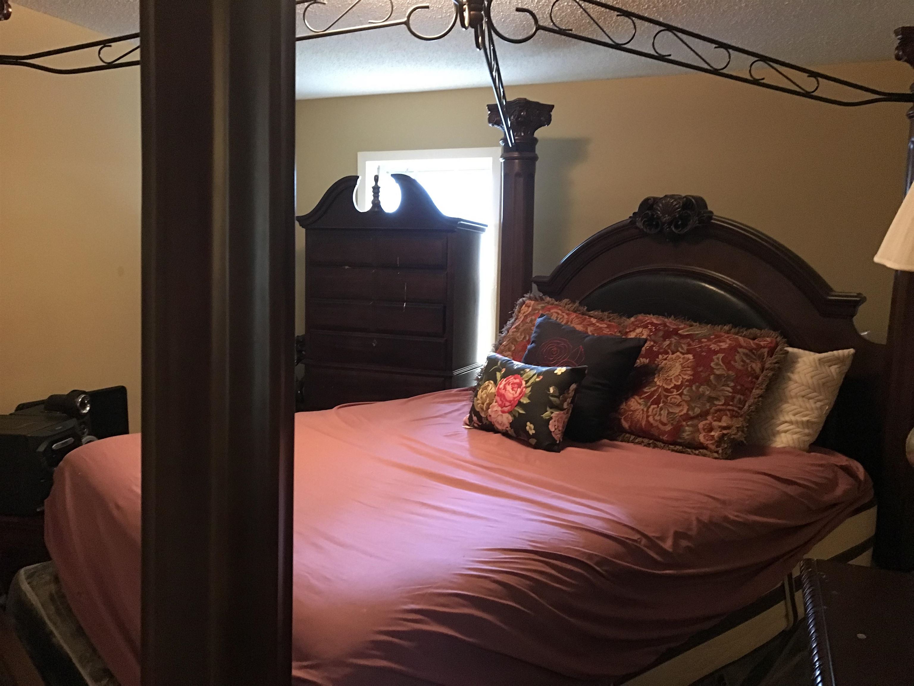 3409 Adrick Road Memphis, TN 38128 - Photo 13 of 14 a bedroom with a bed and a closet