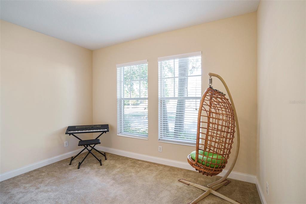320 Ibisview Lane Apollo Beach, FL 33572 - Photo 22 of 30 a view of an empty room with a window and a kitchen