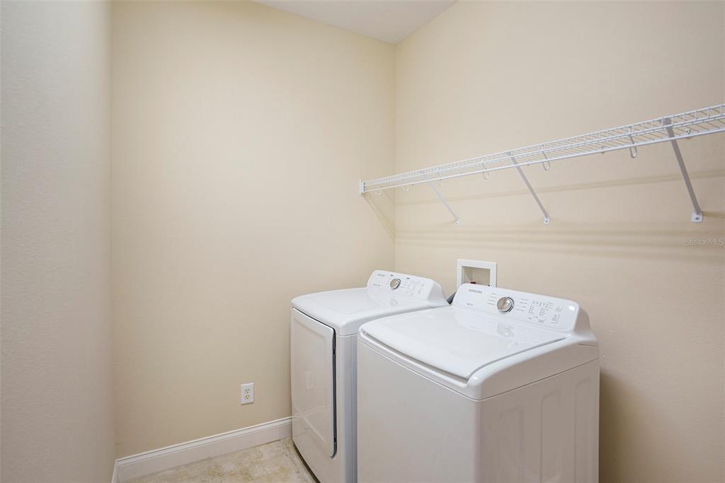 320 Ibisview Lane Apollo Beach, FL 33572 - Photo 24 of 30 a utility room with dryer and washer