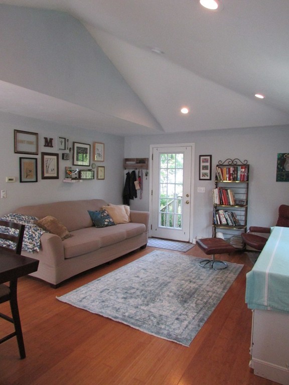 28 Alder Road Norton, MA 02766 - Photo 8 of 27 a living room with furniture and a window