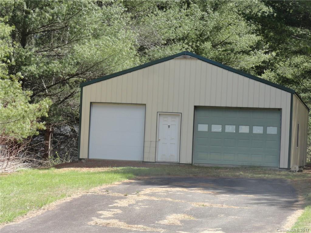 5215 Double Island Road Green Mountain, NC 28740 - Photo 2 of 14 a house with a outdoor space