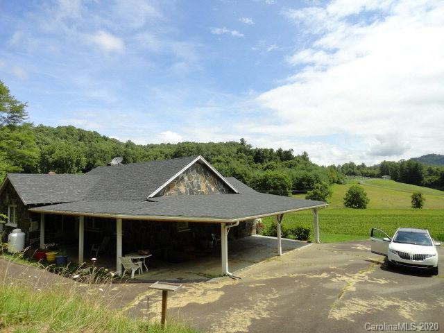 5215 Double Island Road Green Mountain, NC 28740 - Photo 12 of 14 a house view with a garden space