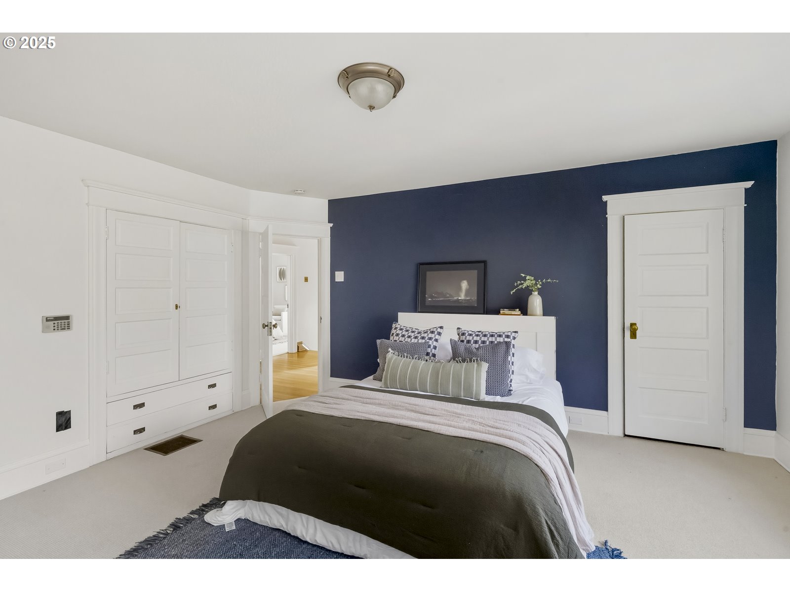 2744 Northeast 16th Avenue Portland, OR 97212 - Photo 24 of 47 a bedroom with a bed and a painting