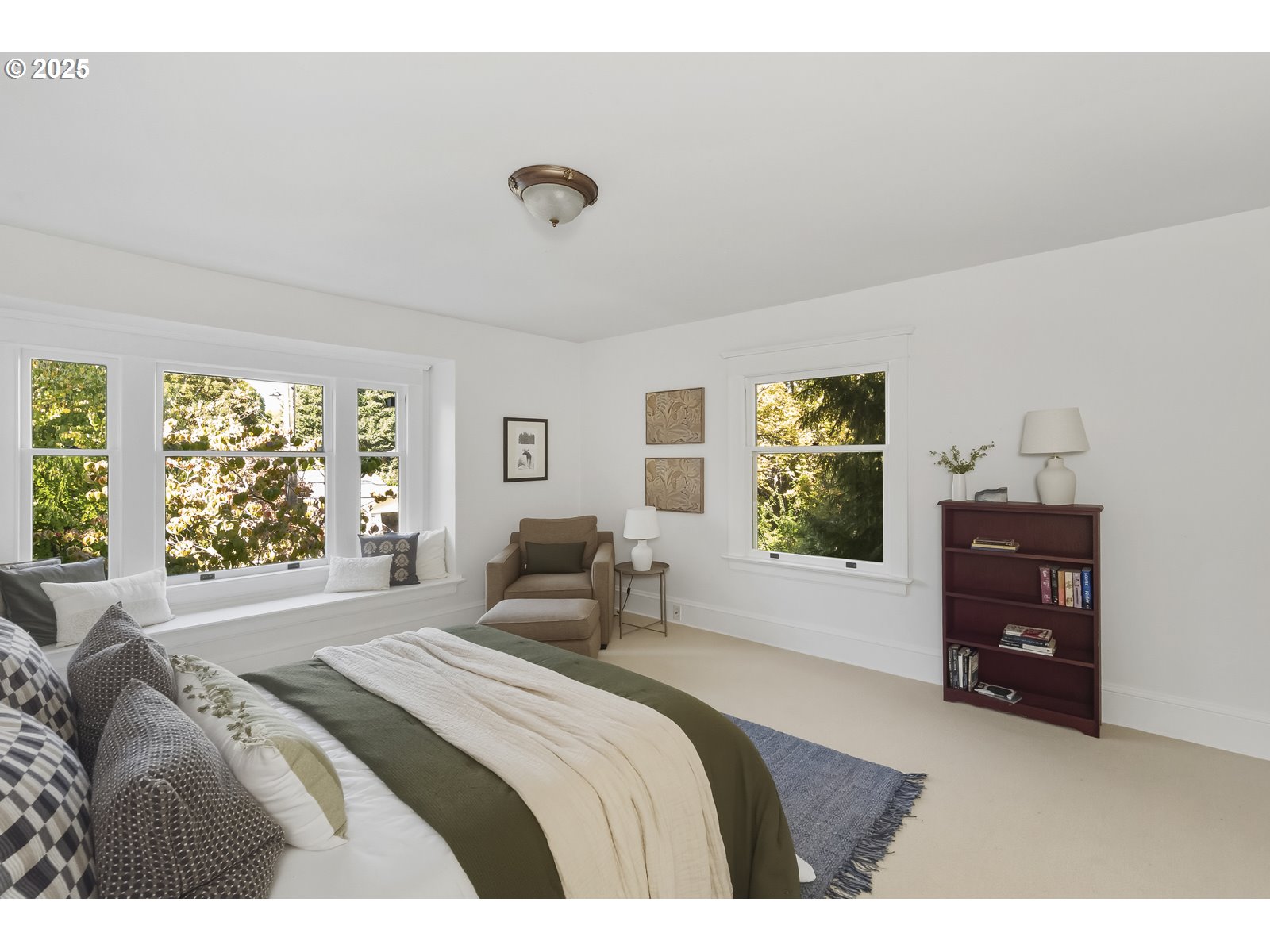 2744 Northeast 16th Avenue Portland, OR 97212 - Photo 25 of 47 a bedroom with a bed and a window