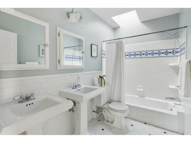 a bathroom with a sink a toilet and a bathtub