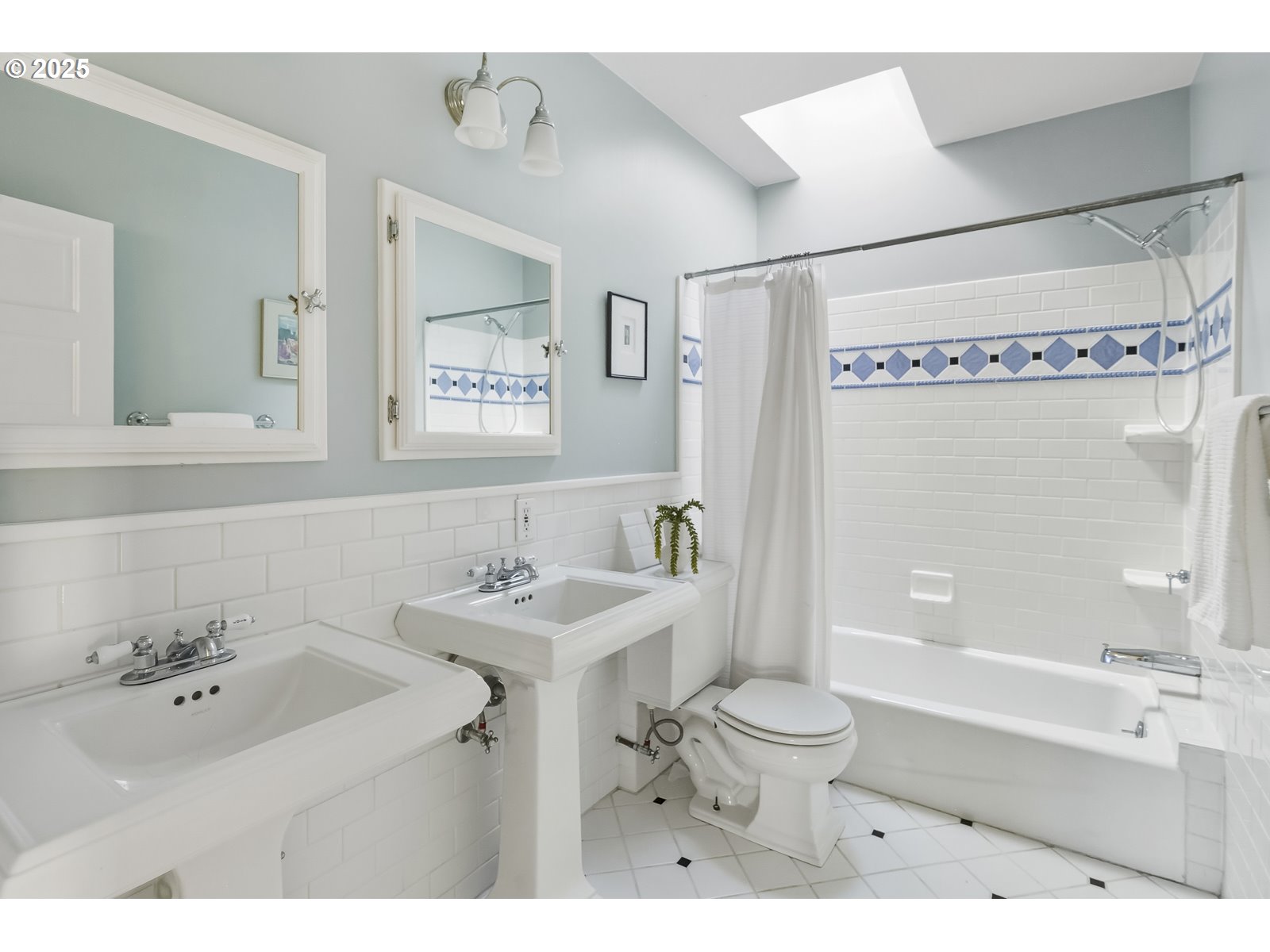 2744 Northeast 16th Avenue Portland, OR 97212 - Photo 29 of 47 a bathroom with a sink a toilet and a bathtub