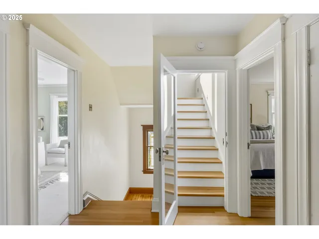 a view of entryway with wooden floor
