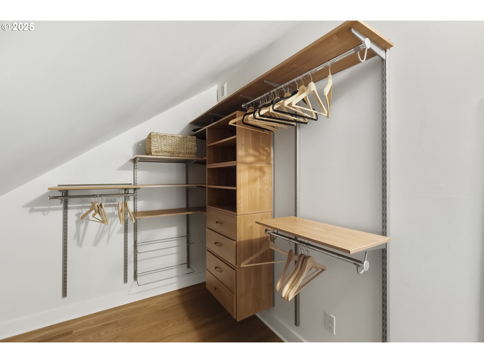 2744 Northeast 16th Avenue Portland, OR 97212 - Photo 35 of 47 a view of walk in closet with clothes and shoes