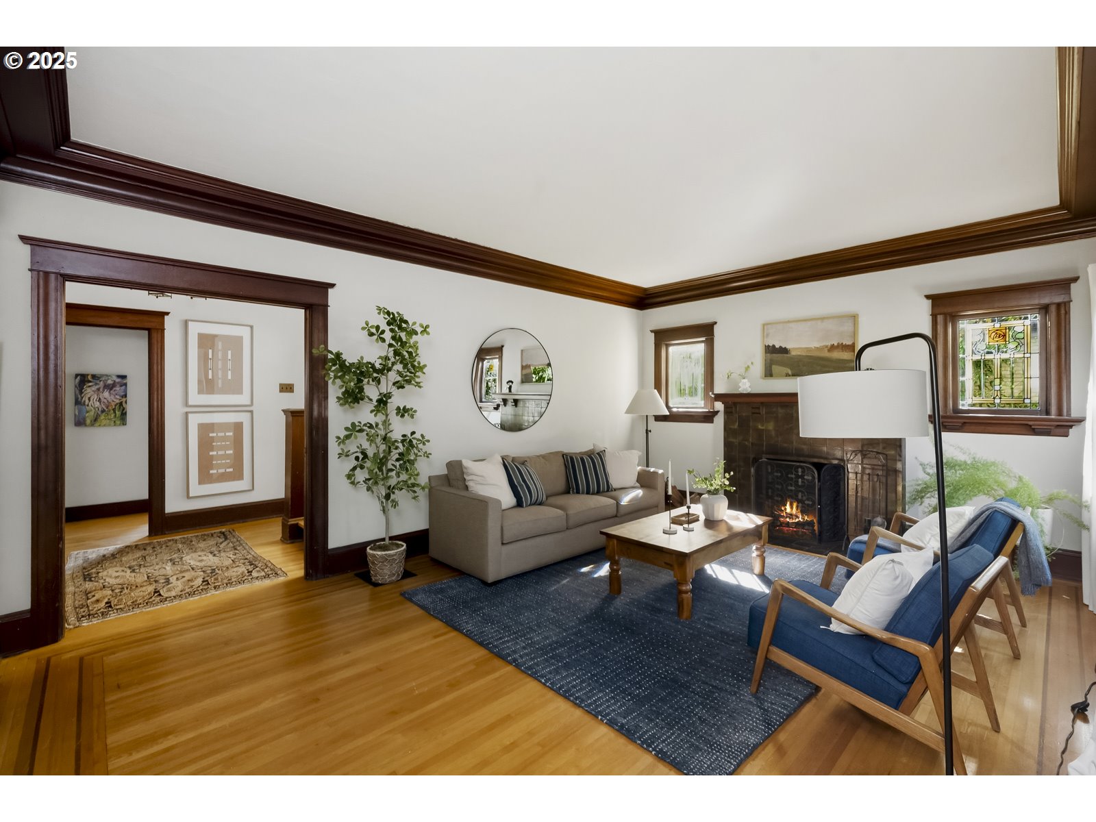 2744 Northeast 16th Avenue Portland, OR 97212 - Photo 4 of 47 a living room with fireplace furniture and a wooden floor