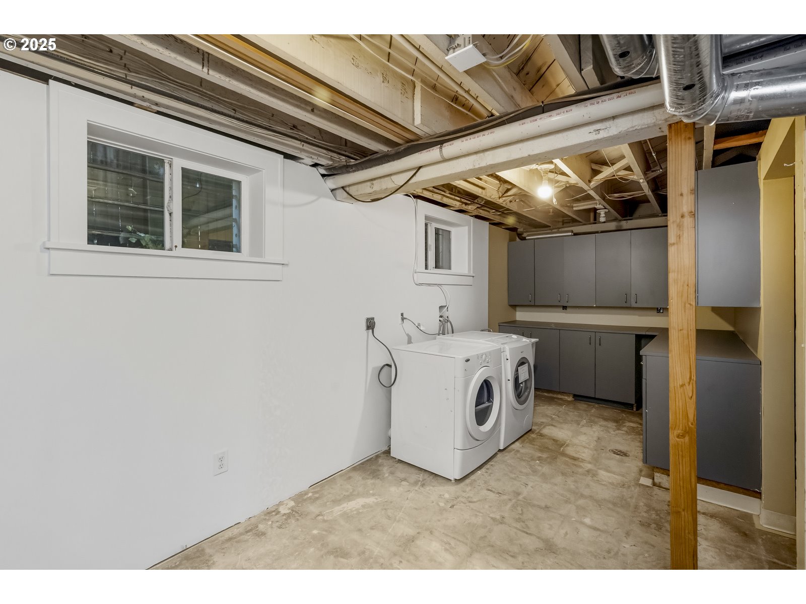 2744 Northeast 16th Avenue Portland, OR 97212 - Photo 42 of 47 a utility room with dryer and washer