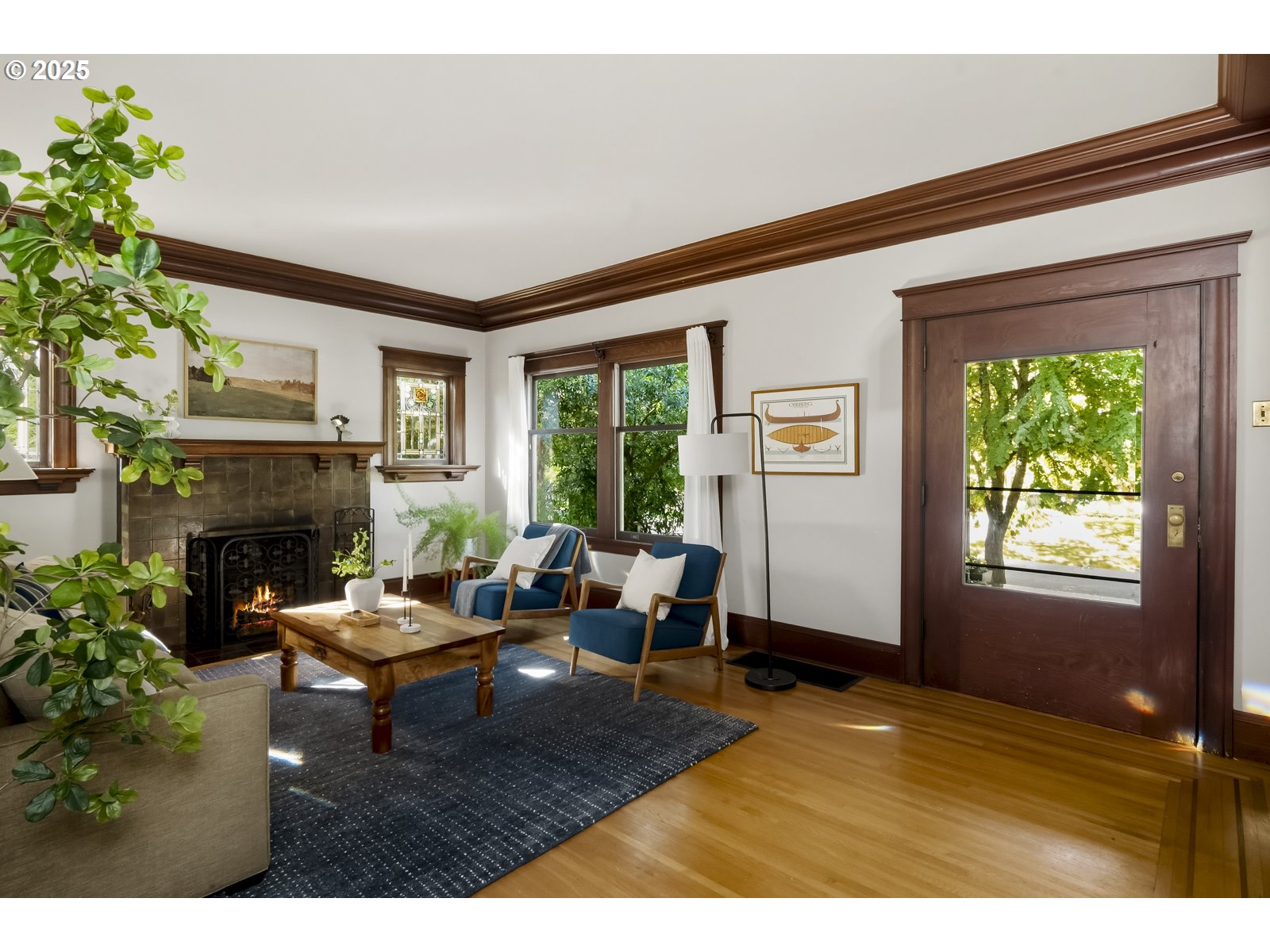 2744 Northeast 16th Avenue Portland, OR 97212 - Photo 6 of 47 a living room with furniture and a fireplace
