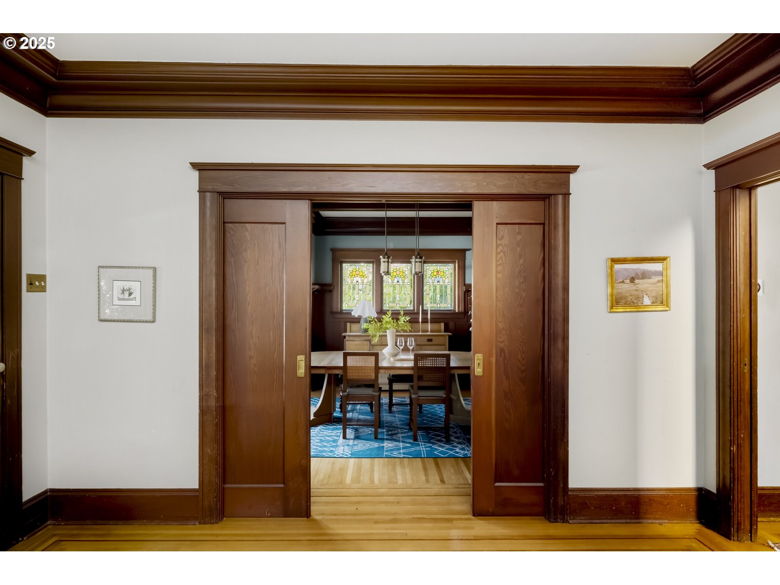 2744 Northeast 16th Avenue Portland, OR 97212 - Photo 7 of 47 a living room with a table and a potted plant