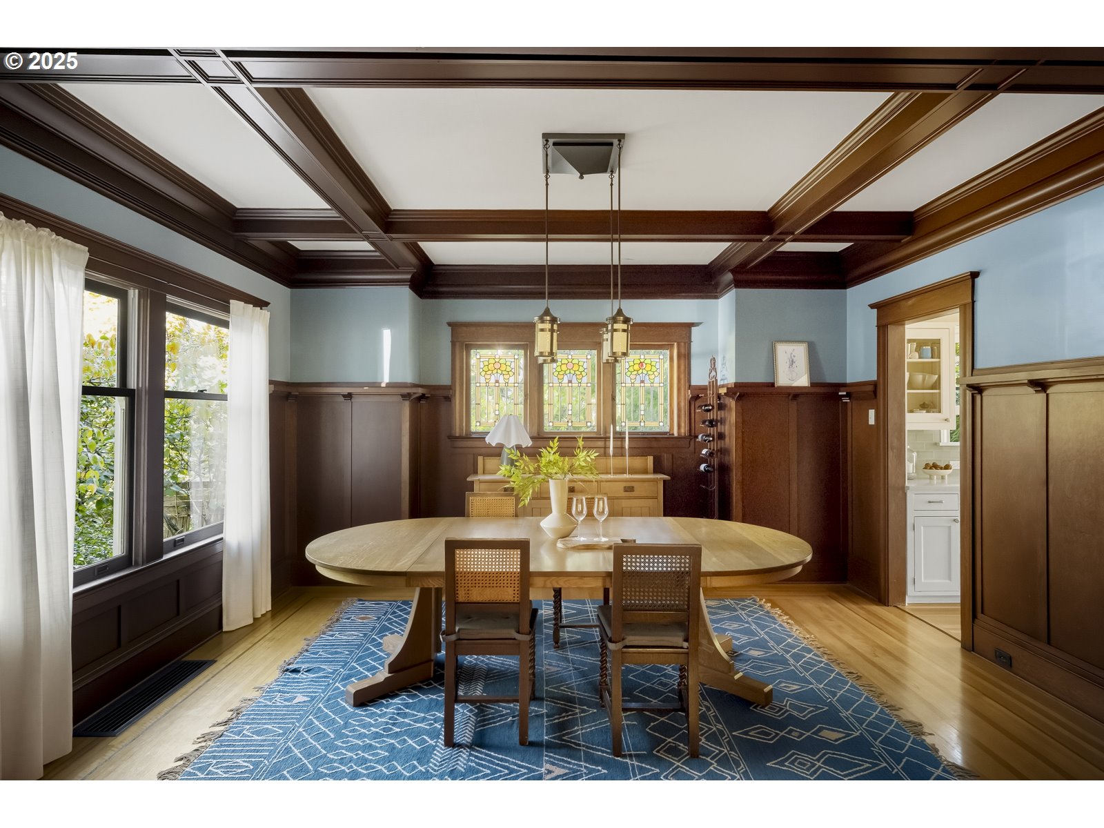 2744 Northeast 16th Avenue Portland, OR 97212 - Photo 8 of 47 a view of a dining room with furniture window and wooden floor