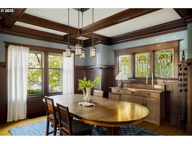 a kitchen with a table and chairs