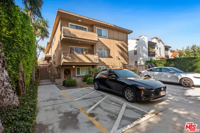 a car parked in front of a house