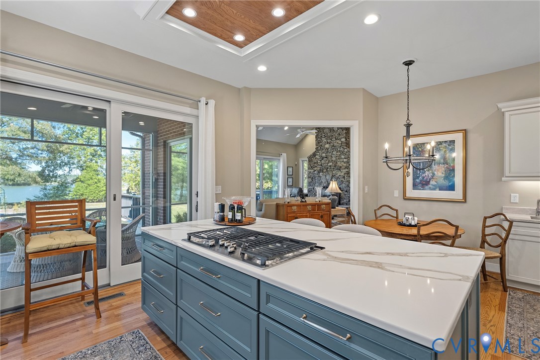 447 Tranquility Road Reedville, VA 22539 - Photo 35 of 82 Kitchen featuring a central island with a cooktop,