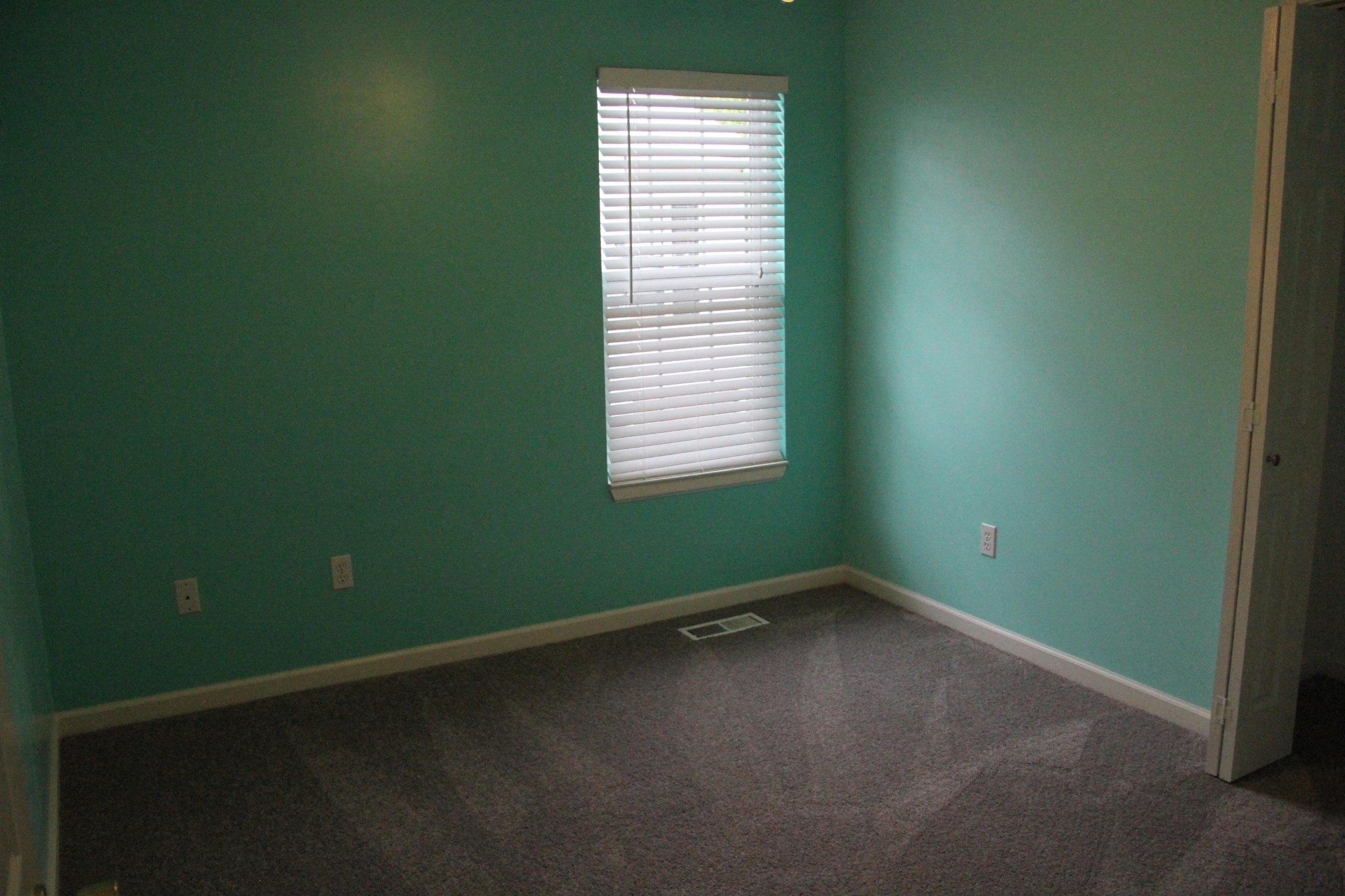 61612 Steekee Road Loudon, TN 37774 - Photo 15 of 23 a view of an empty room with a window and a fan
