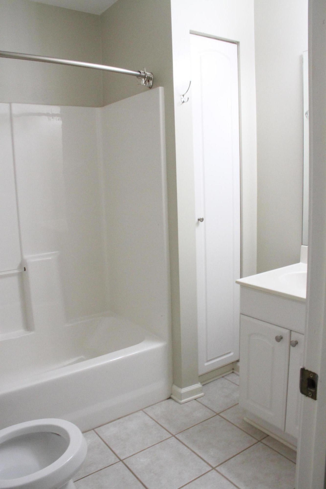 61612 Steekee Road Loudon, TN 37774 - Photo 16 of 23 a bathroom with a bathtub and a shower