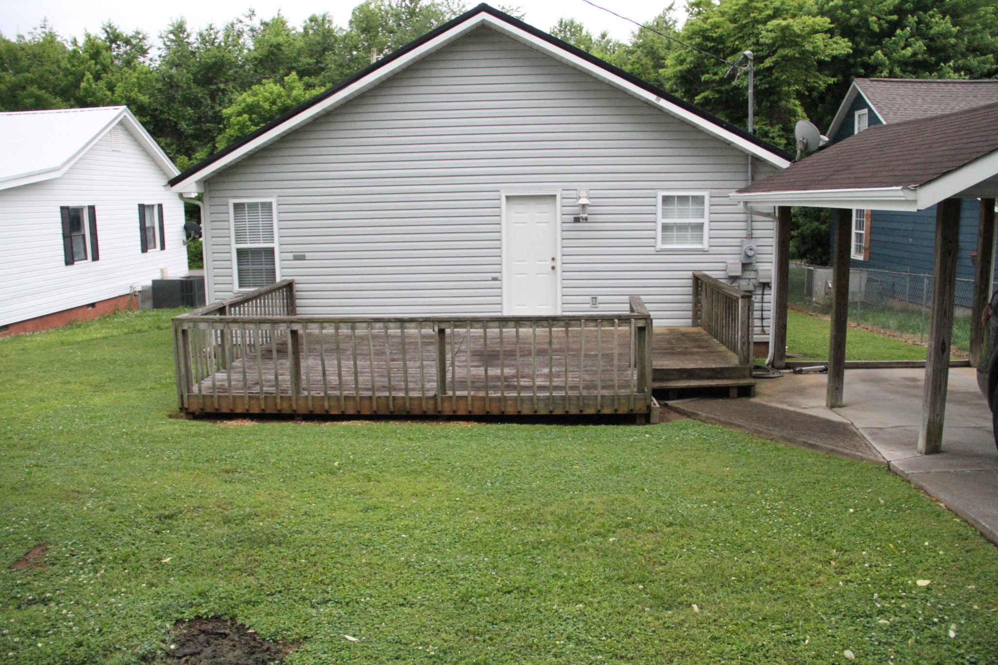 61612 Steekee Road Loudon, TN 37774 - Photo 19 of 23 a view of a house with a yard and deck