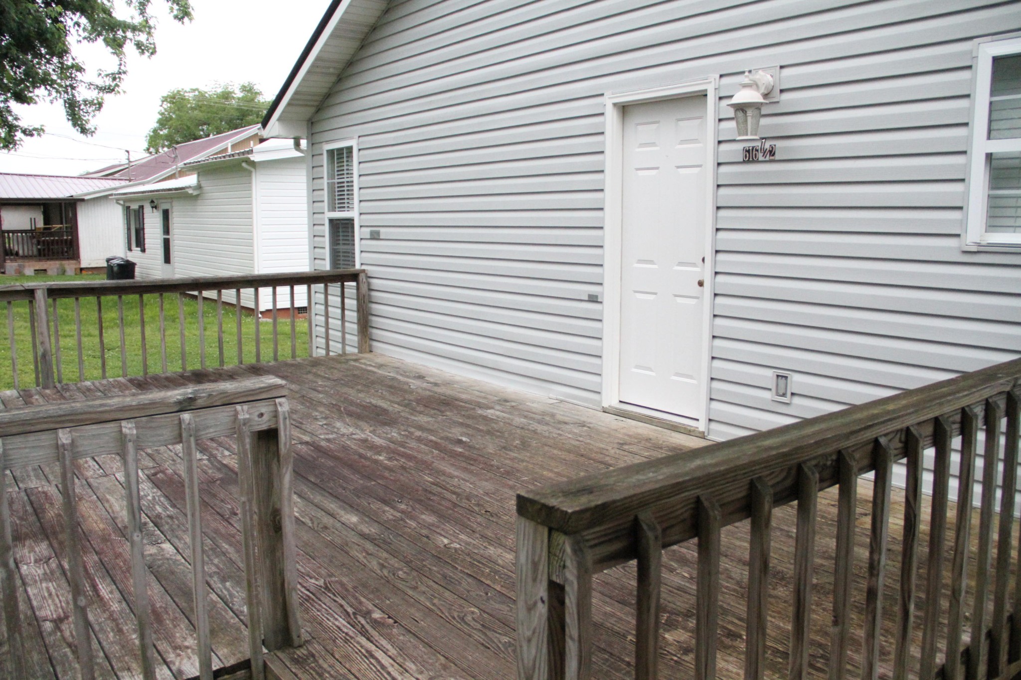 61612 Steekee Road Loudon, TN 37774 - Photo 22 of 23 a view of a wooden deck and a yard