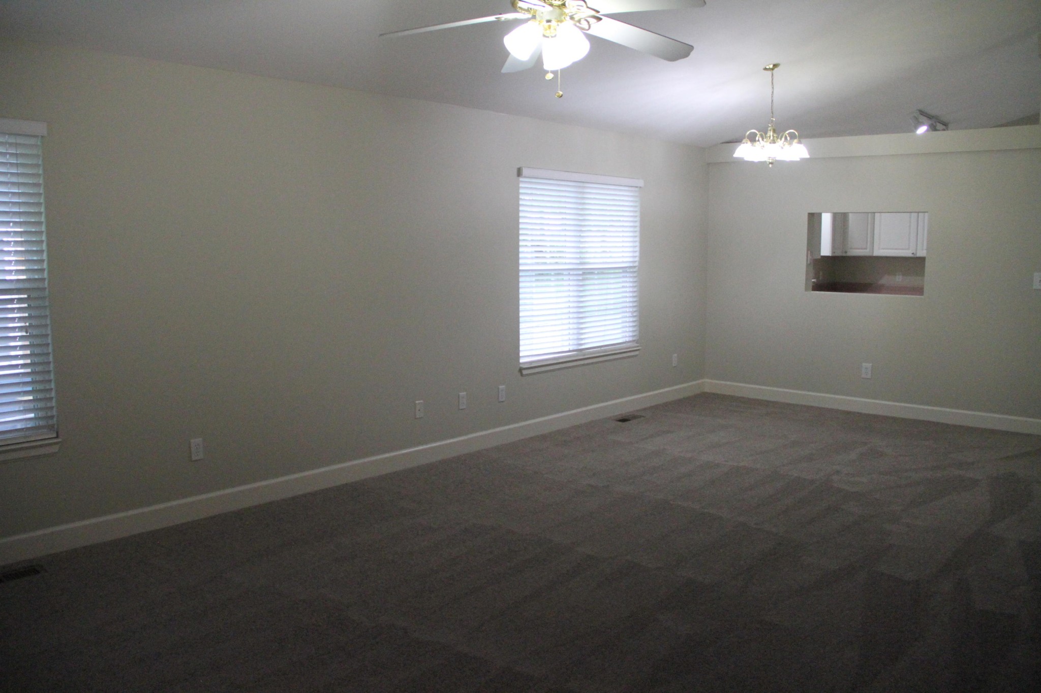 61612 Steekee Road Loudon, TN 37774 - Photo 8 of 23 an empty room with windows and fan