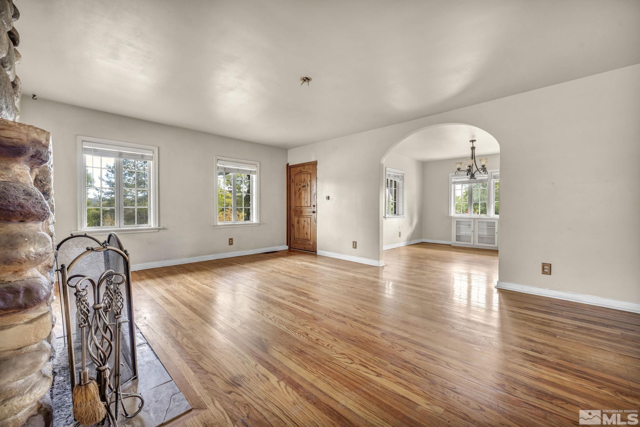 1035 Lander Street Reno, NV 89509 - Photo 8 of 40 a view of a livingroom with wooden floor and furniture