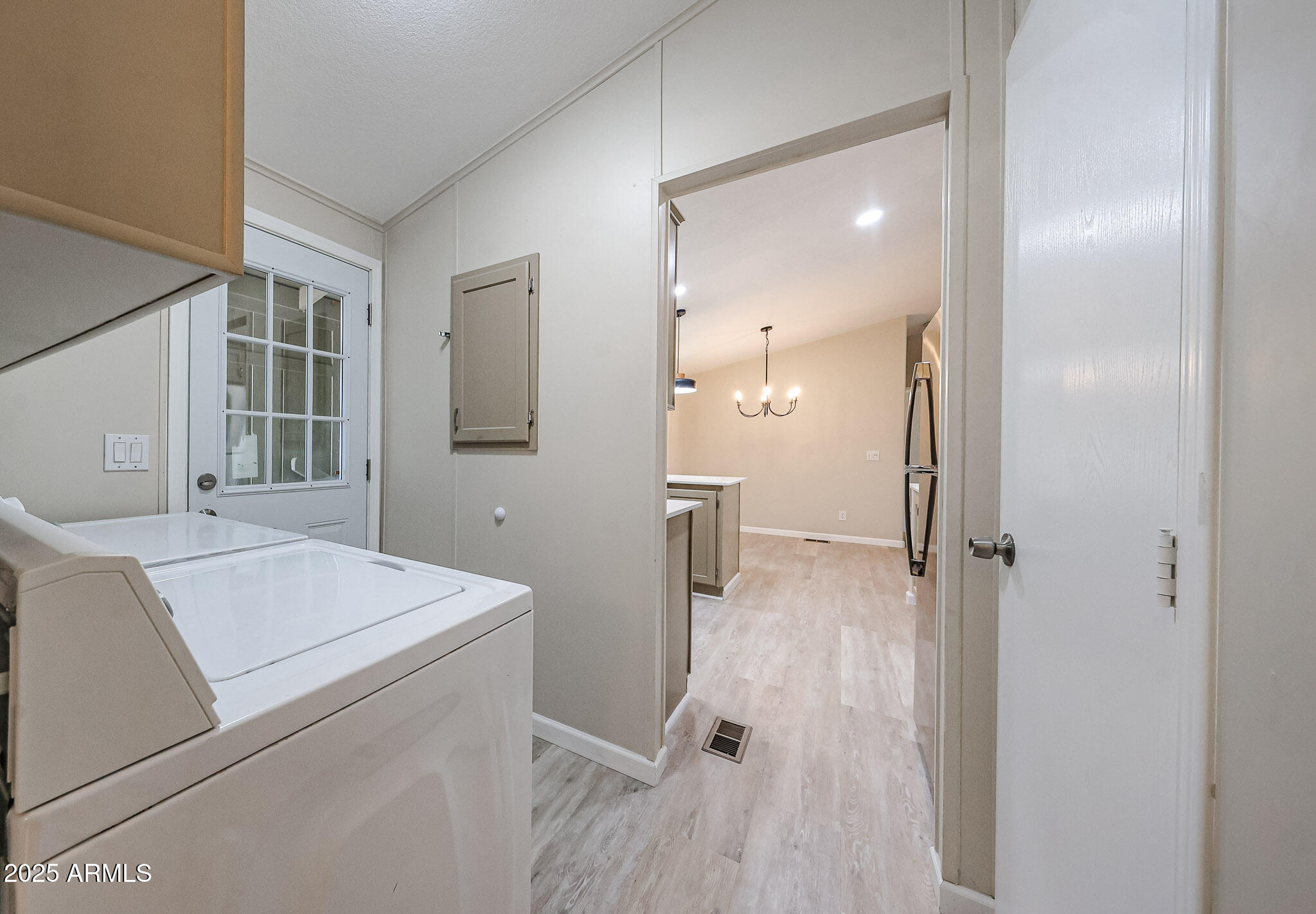 3901 East Pinnacle Peak Road, Unit 108 Phoenix, AZ 85050 - Photo 23 of 30 a bathroom with a sink and mirror with toilet