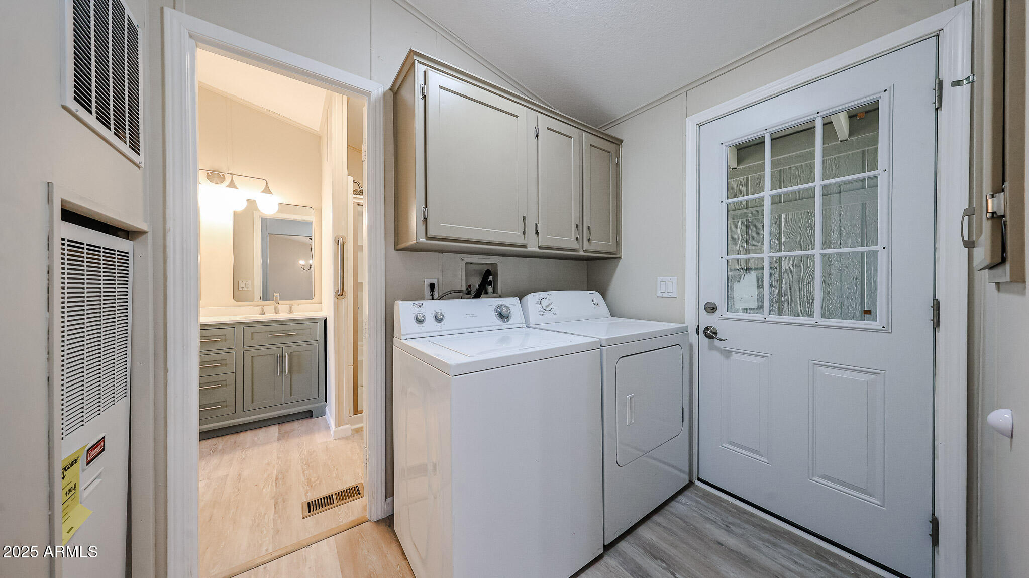 3901 East Pinnacle Peak Road, Unit 108 Phoenix, AZ 85050 - Photo 24 of 30 a utility room with closet dryer and washer