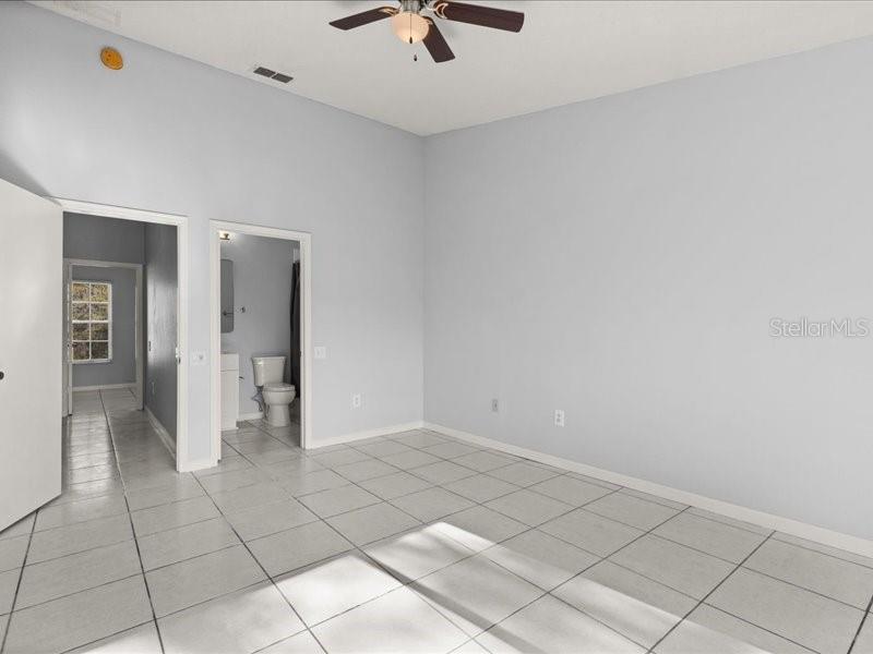 29924 Playa Del Rey Lane Wesley Chapel, FL 33543 - Photo 17 of 31 a view of an empty room and window