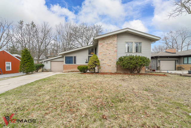 52 Monee Road Park Forest, IL 60466 - Photo 22 of 22 a view of a house with backyard and garden