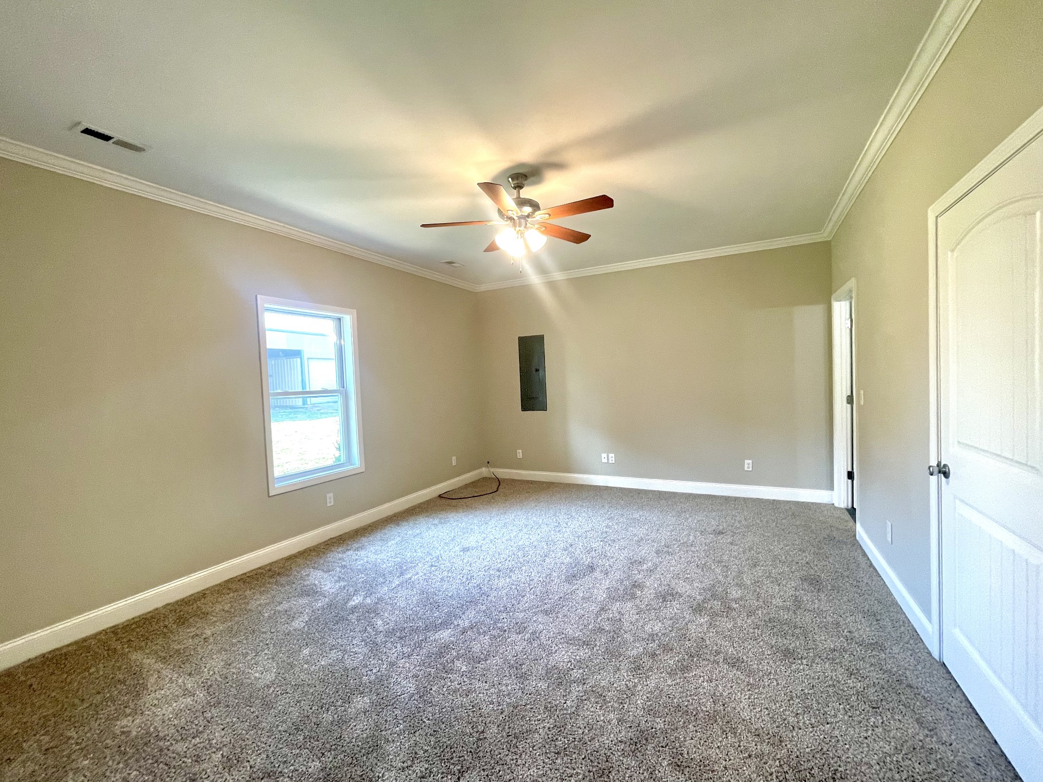 10591 Bell Station Road Oak Grove, KY 42262 - Photo 14 of 35 an empty room with windows and ceiling fan