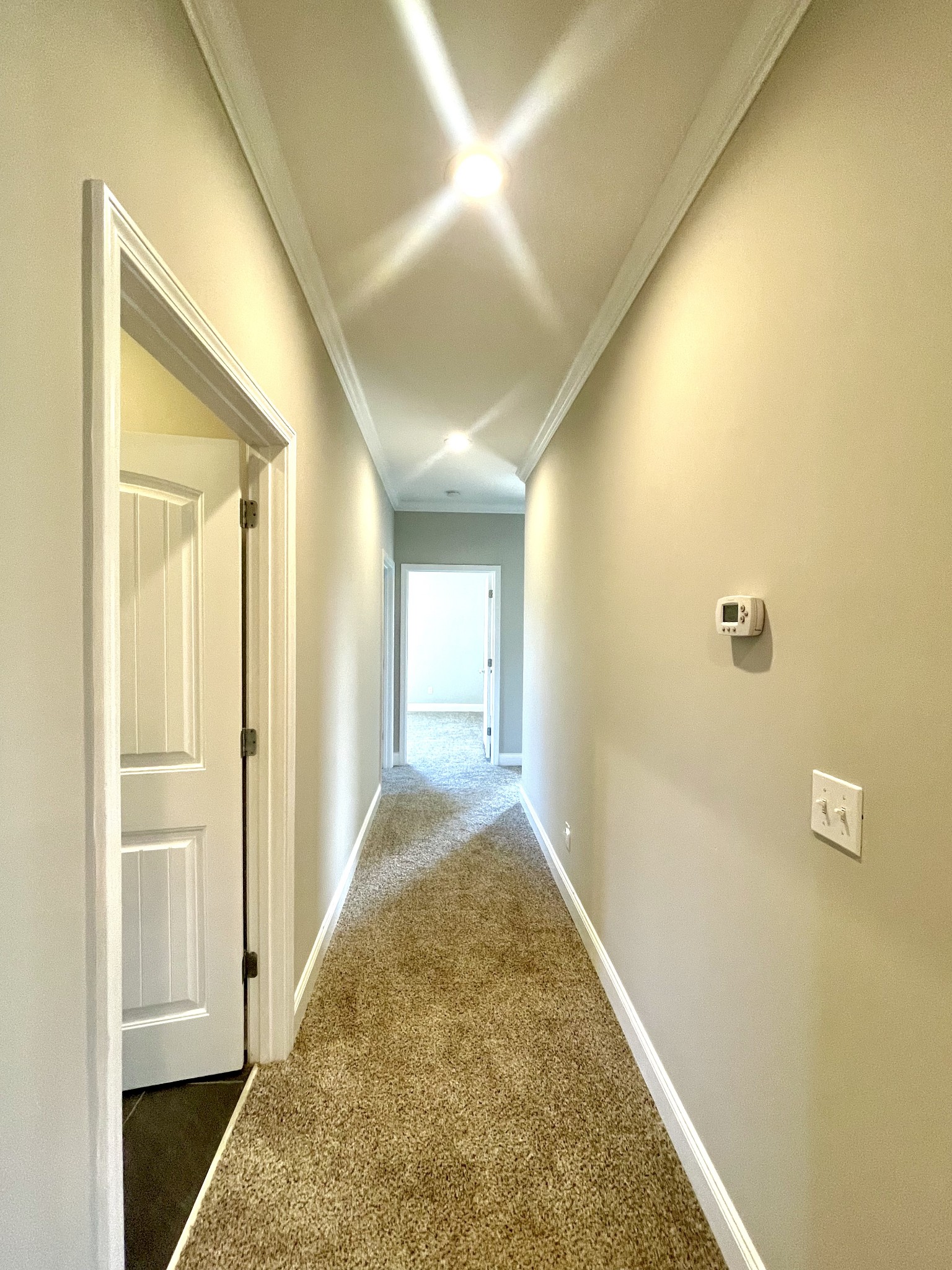 10591 Bell Station Road Oak Grove, KY 42262 - Photo 19 of 35 a view of a hallway with wooden floor