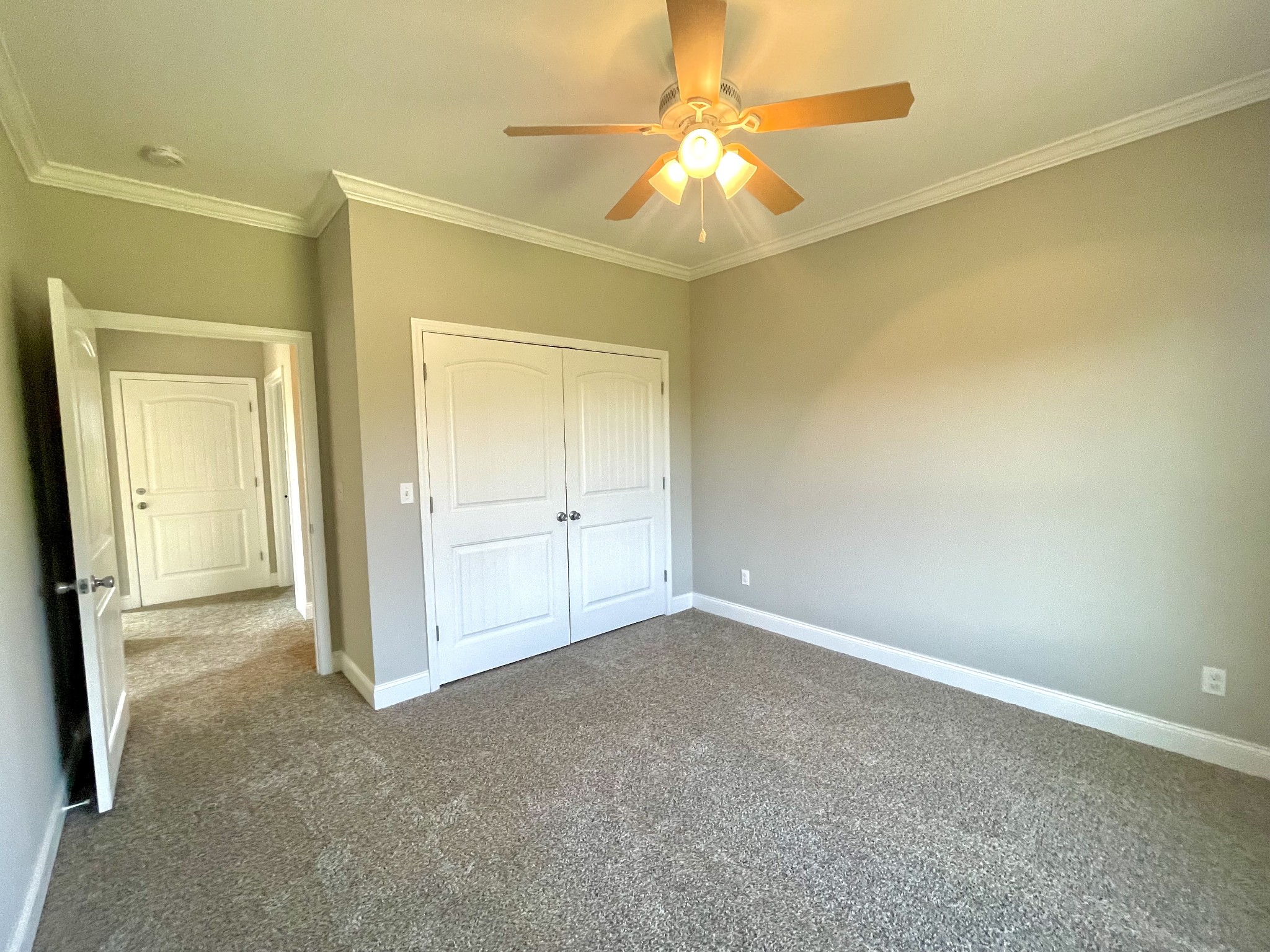 10591 Bell Station Road Oak Grove, KY 42262 - Photo 23 of 35 an empty room with a empty space and a ceiling fan