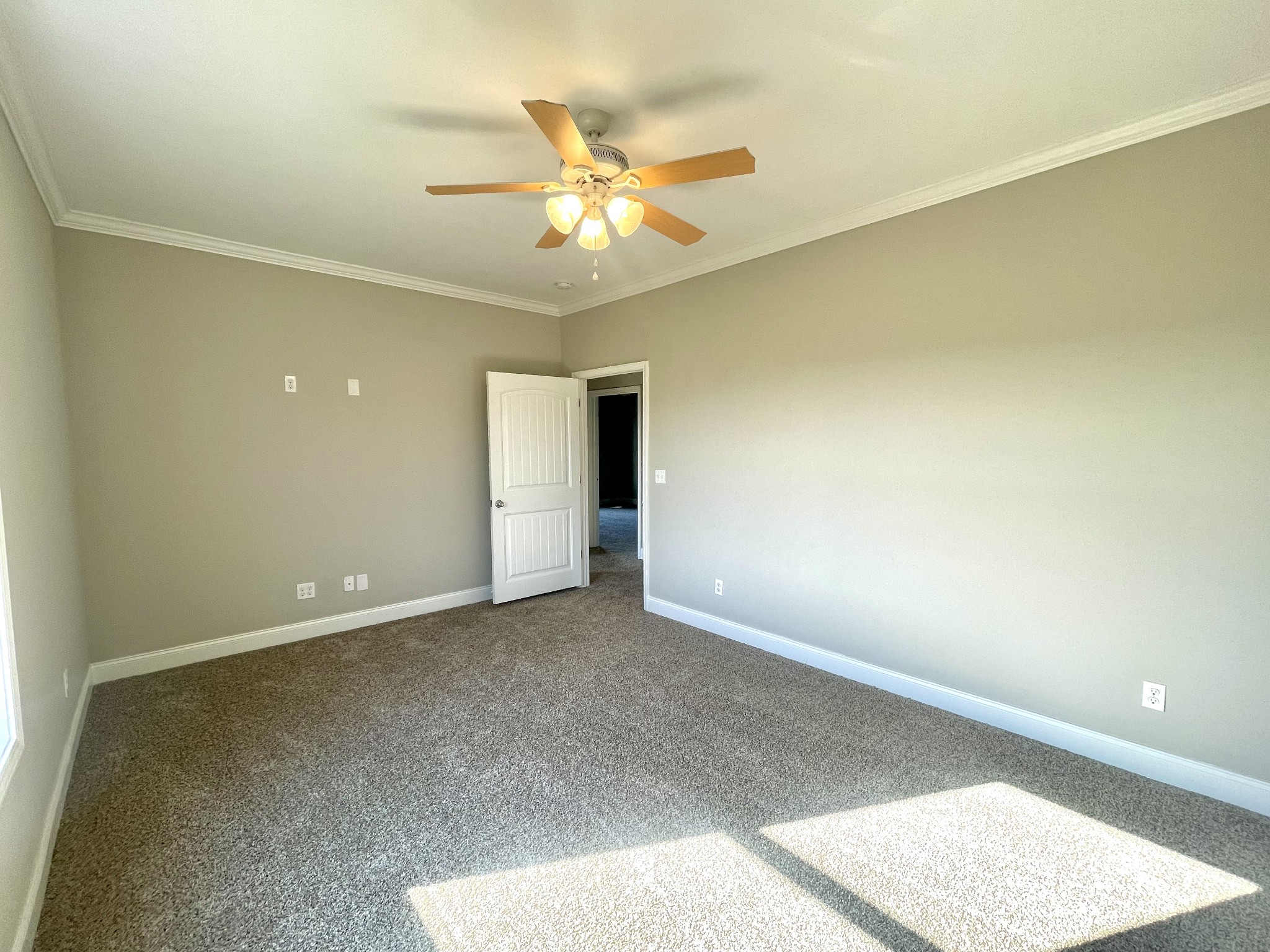10591 Bell Station Road Oak Grove, KY 42262 - Photo 25 of 35 an empty room with wooden floor and fan