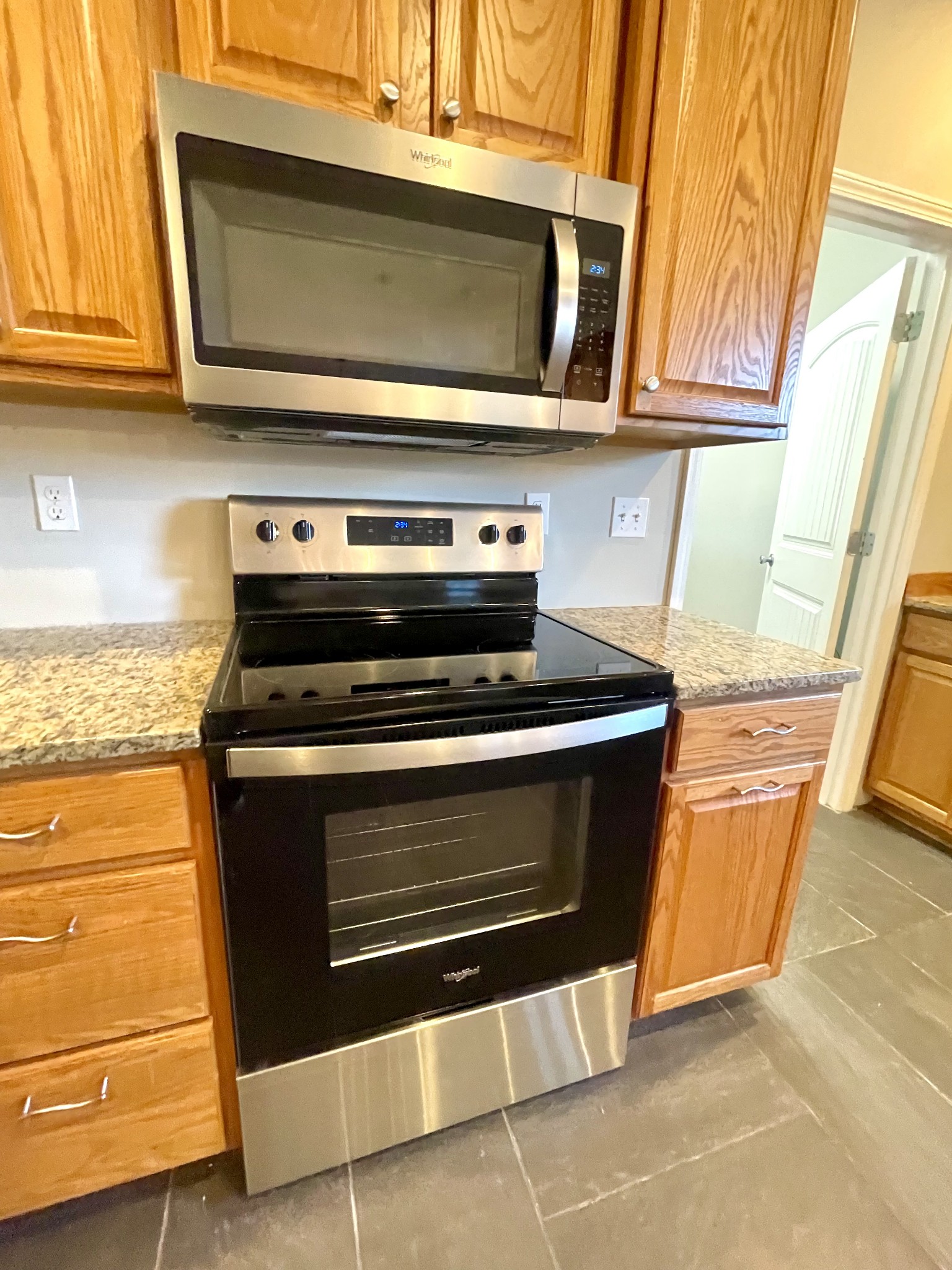 10591 Bell Station Road Oak Grove, KY 42262 - Photo 6 of 35 a stove top oven sitting inside of a kitchen