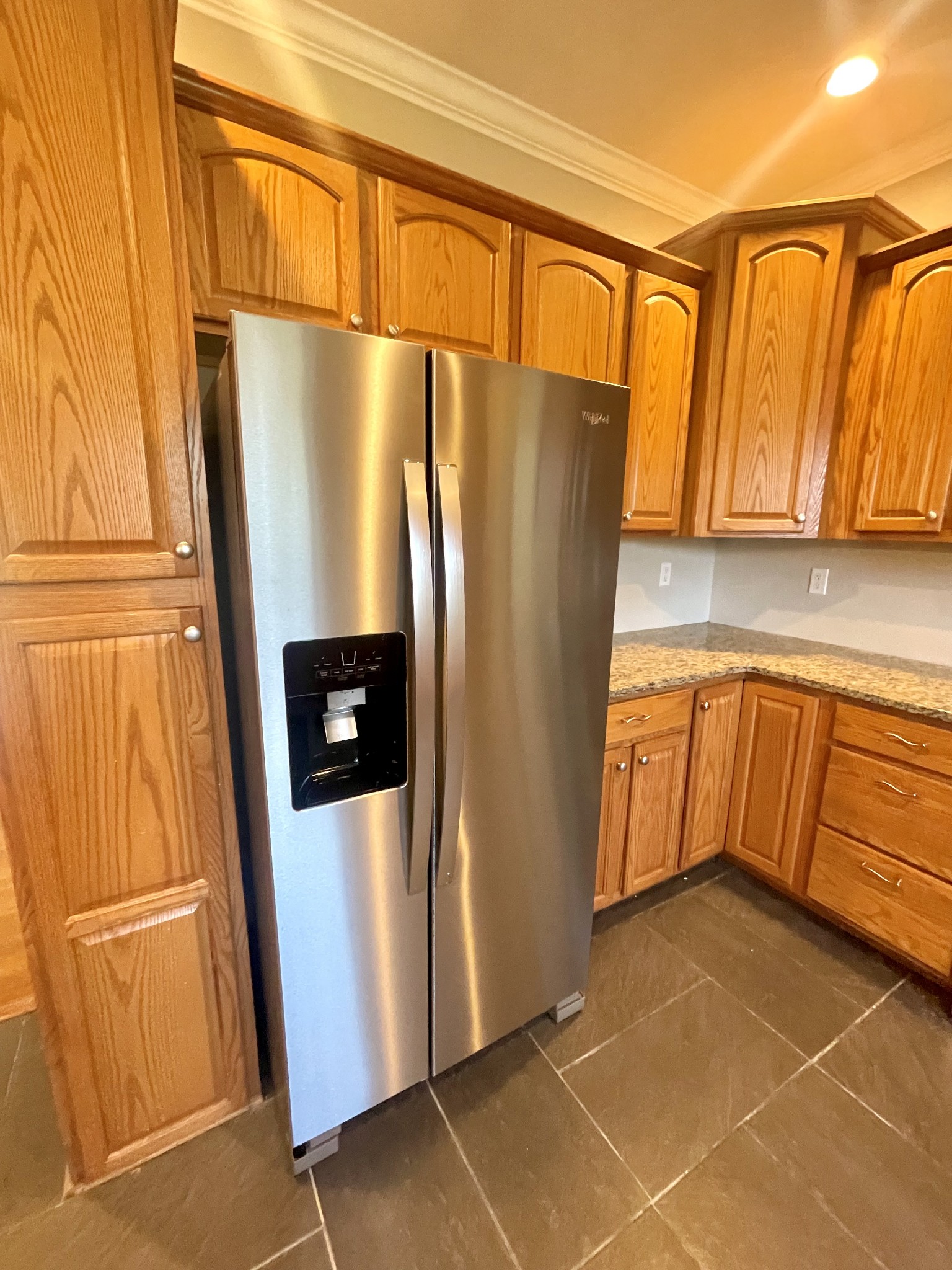 10591 Bell Station Road Oak Grove, KY 42262 - Photo 7 of 35 a kitchen with stainless steel appliances a refrigerator and cabinets