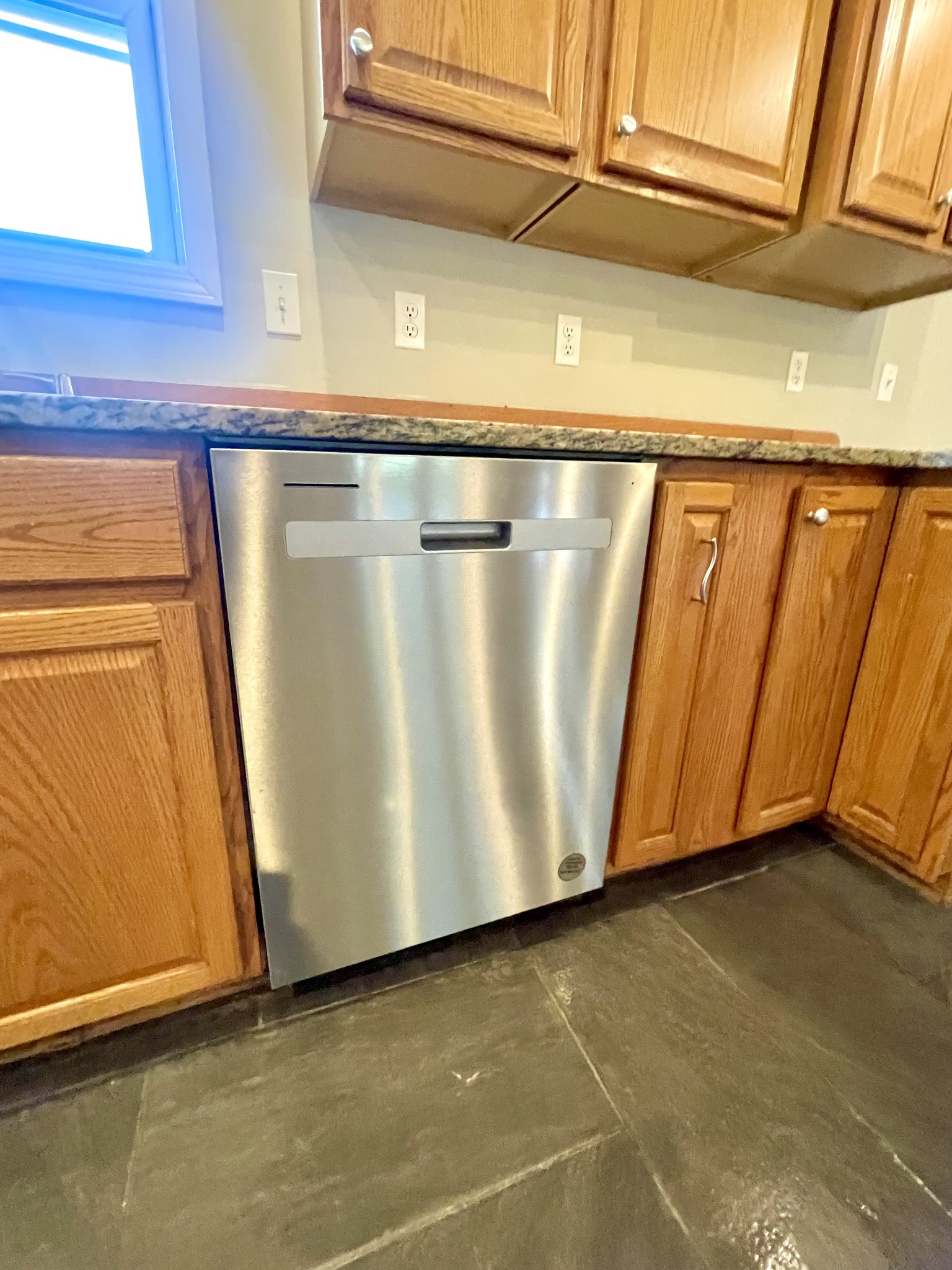 10591 Bell Station Road Oak Grove, KY 42262 - Photo 8 of 35 a view of a garage with wooden floor and a window