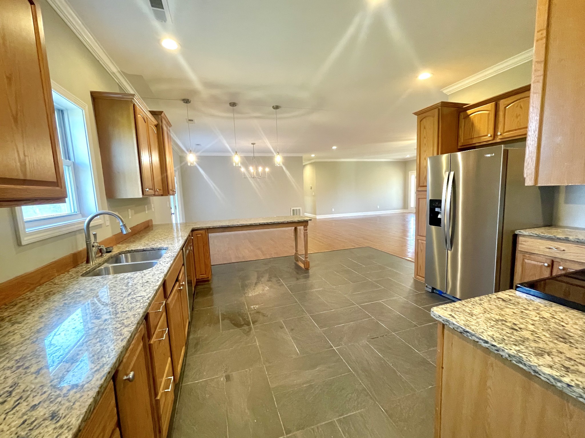 10591 Bell Station Road Oak Grove, KY 42262 - Photo 9 of 35 a bathroom with a granite countertop sink a toilet and mirror