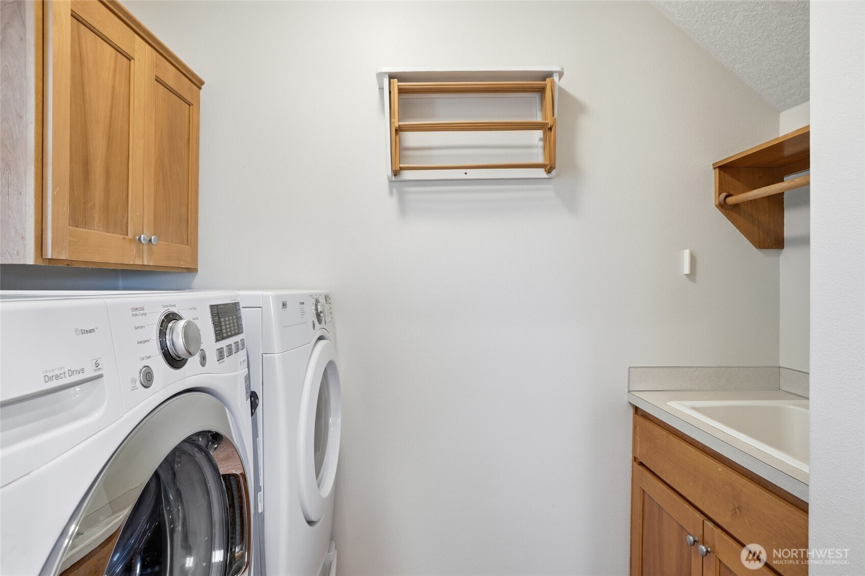 3550 Northeast 214th Avenue Fairview, OR 97024 - Photo 22 of 40 a view of storage and utility room with washer and dryer