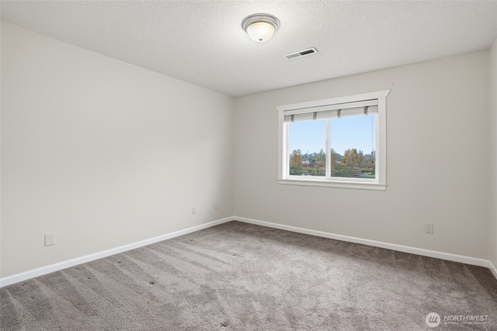 3550 Northeast 214th Avenue Fairview, OR 97024 - Photo 26 of 40 an empty room with a window