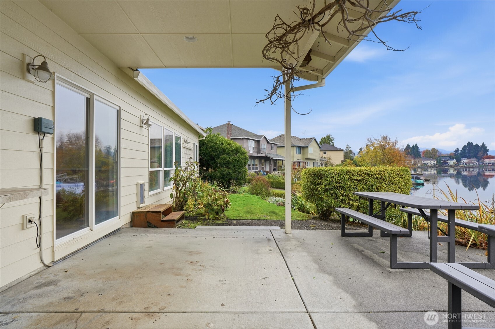 3550 Northeast 214th Avenue Fairview, OR 97024 - Photo 27 of 40 a roof deck with table and chairs and potted plants